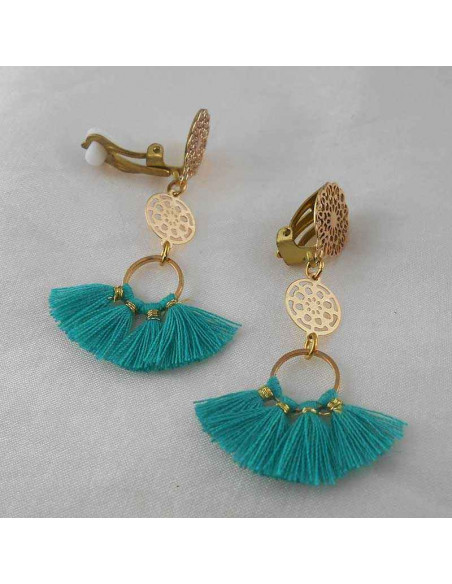 Boucle d'oreille clip pompon turquoise