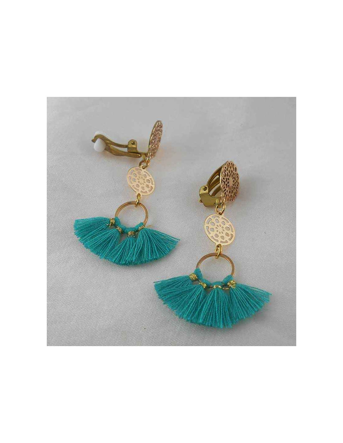 Boucle d'oreille clip pompon turquoise